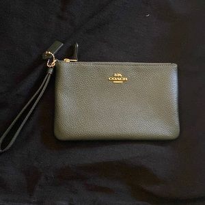 Dark forest green almost looks black coach wristlet